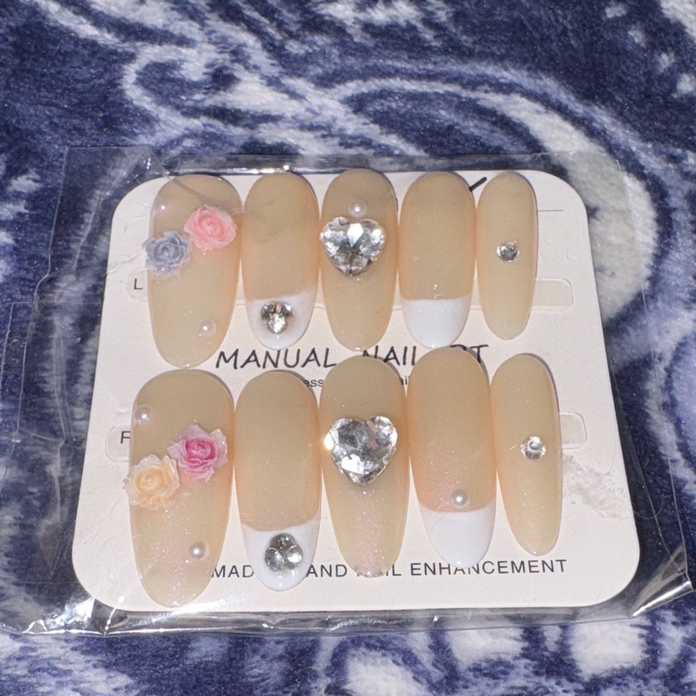 Elegant Nude Press-On Nails with Rhinestones and Floral Accents